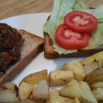 black bean and rice burger with oven roasted potatoes