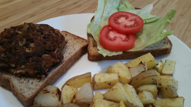 black bean and rice burger with oven roasted potatoes