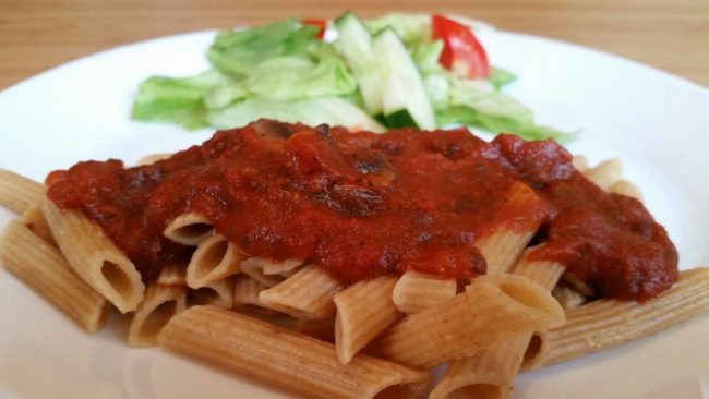 spaghetti with homemade sauce and salad